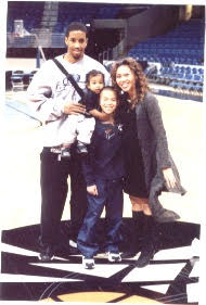 Amy Owen with her family courtside at a Cavaliers game
